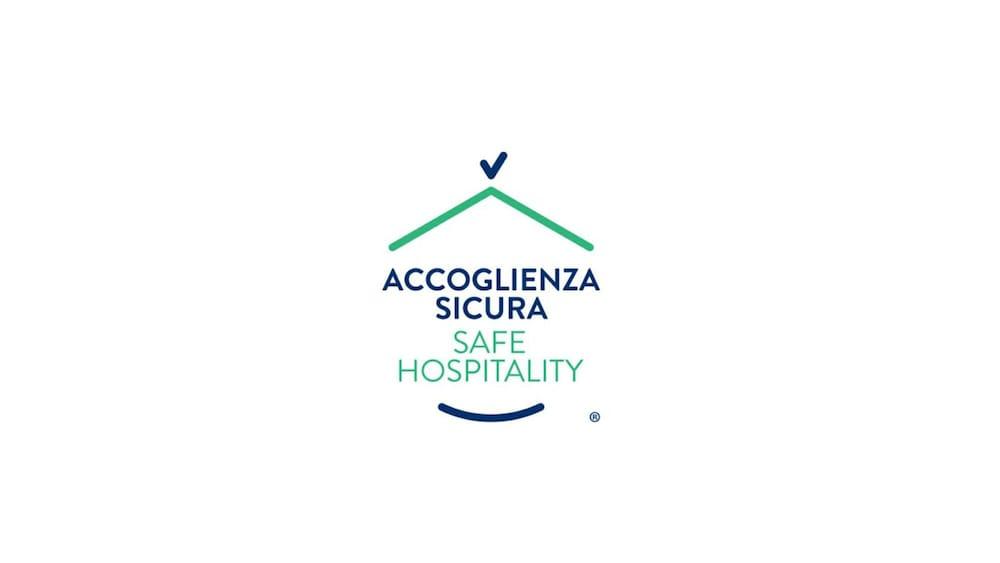 Flyon Hotel & Conference Center Bologna Esterno foto Logo of Accoglienza Sicura
